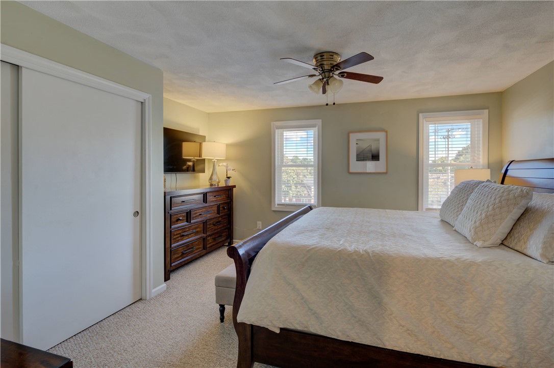 3399 Post Road, Unit 9 Warwick, RI 02886 - Photo 18 of 26 Primary bedroom with large double closet