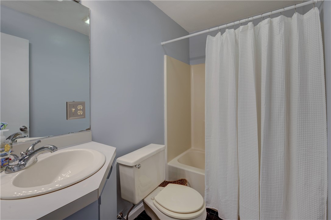 3399 Post Road, Unit 9 Warwick, RI 02886 - Photo 20 of 26 Primary en-suite bathroom with tub and shower.
