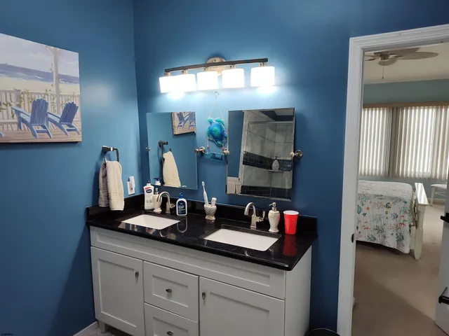 a view of a house with backyard and a tree