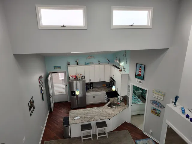 a bedroom with bed and a window