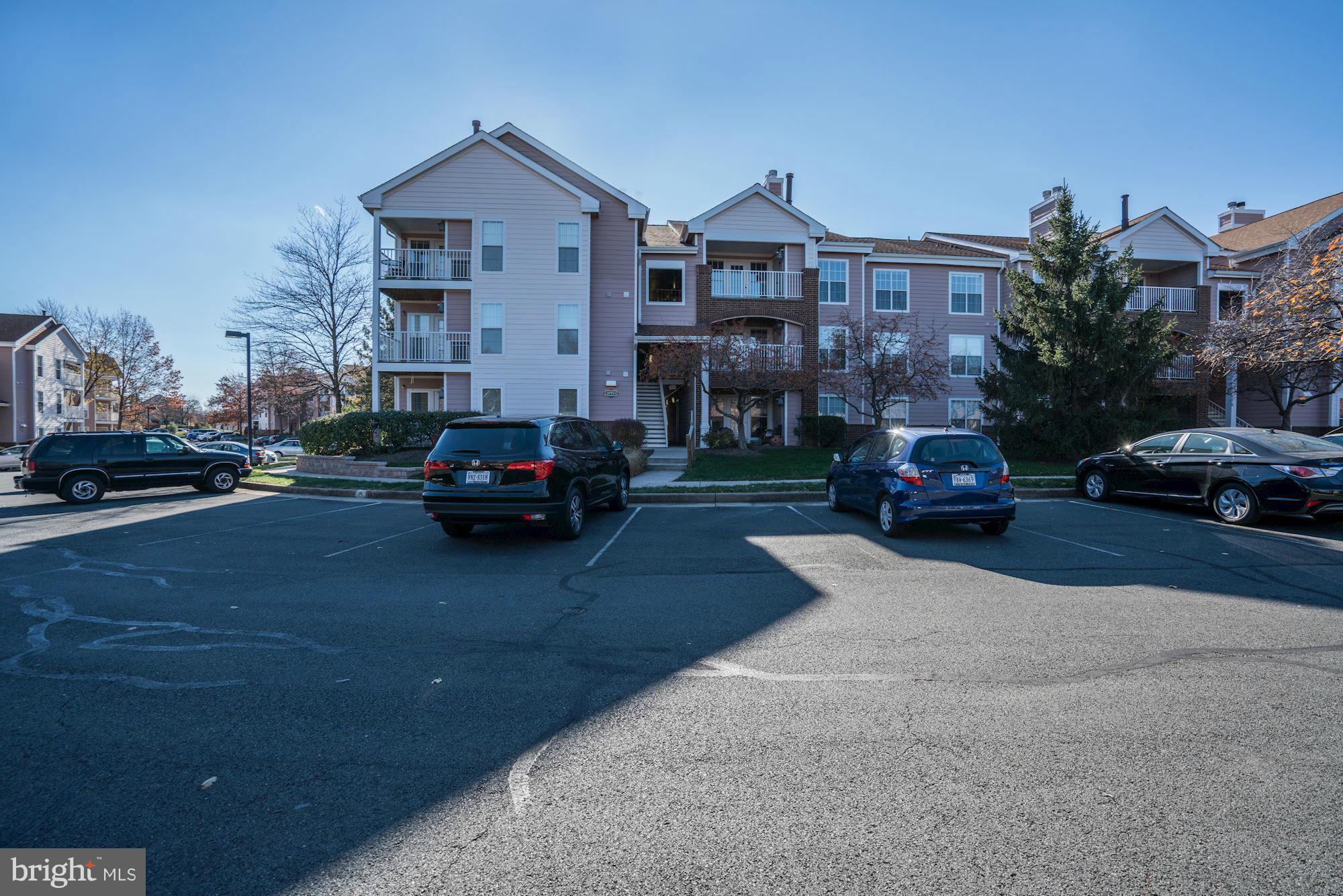 20951 Timber Ridge Terrace, Unit 302 Ashburn, VA 20147 - Photo 1 of 23 Exterior (Front)