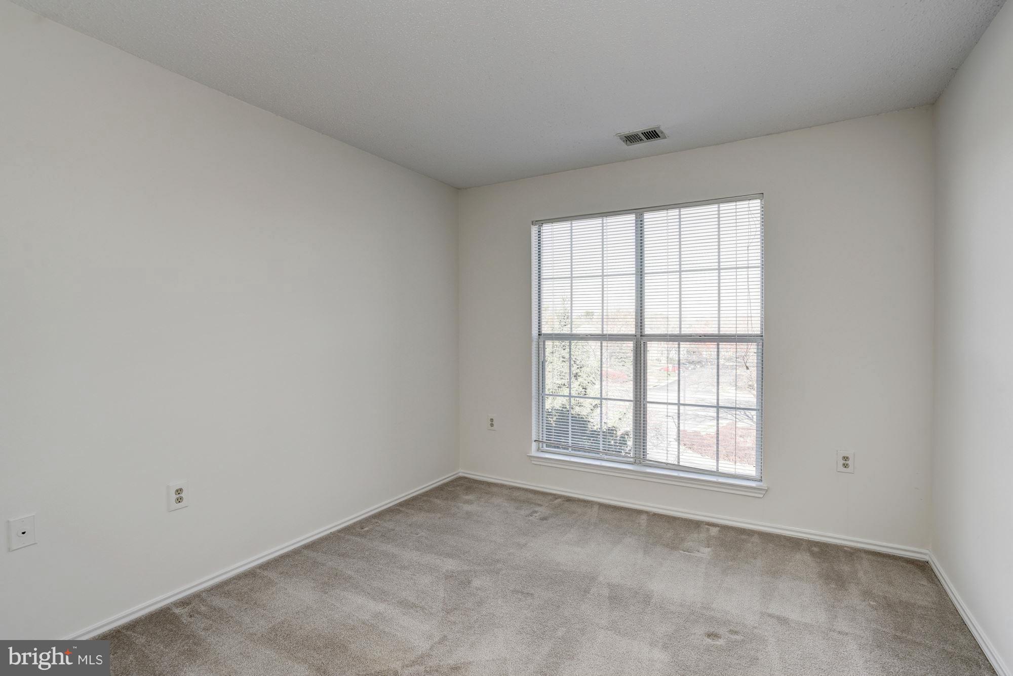 20951 Timber Ridge Terrace, Unit 302 Ashburn, VA 20147 - Photo 11 of 23 Bedroom