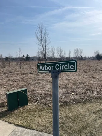 a street sign on a pole on a road