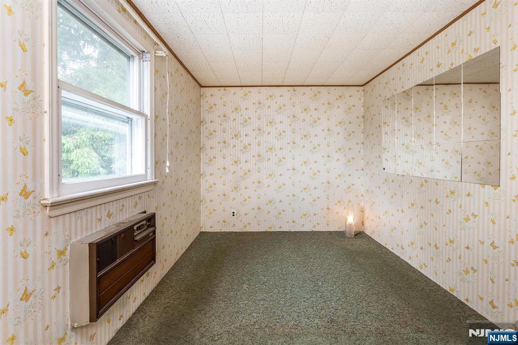 66 Coeyman Avenue Bloomfield, NJ 07003 - Photo 19 of 29 a view of wooden floor and a fireplace