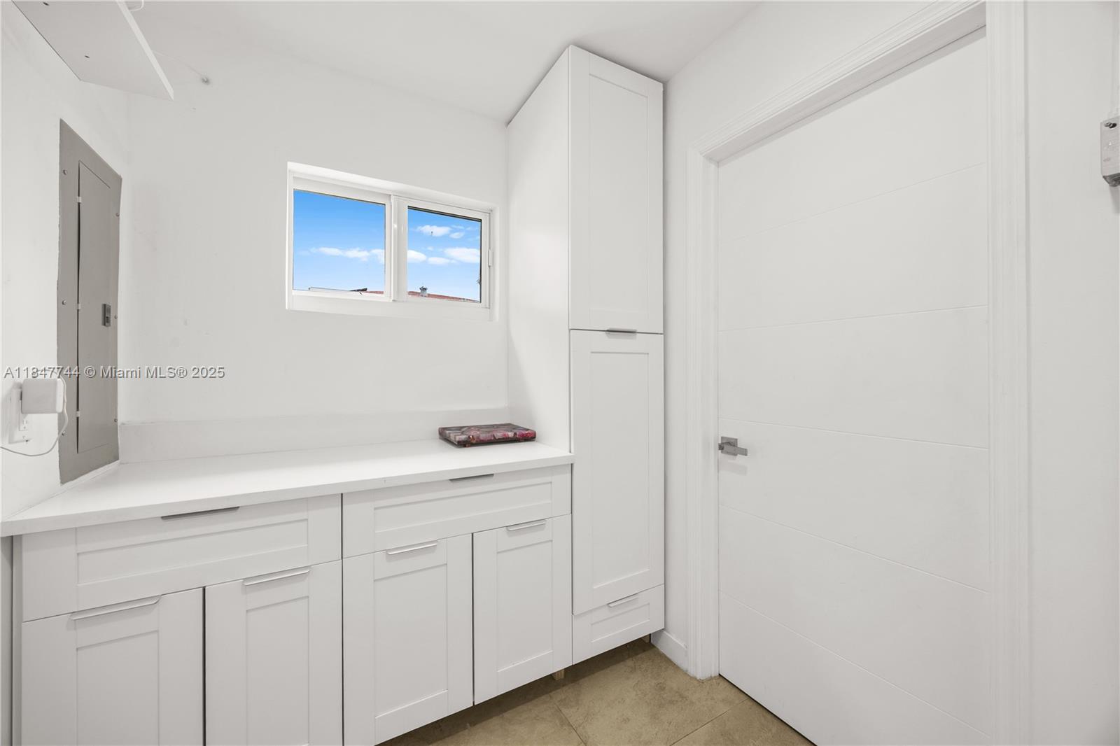 3246 Pierce Street Hollywood, FL 33021 - Photo 23 of 41 a room with a closet and mirror