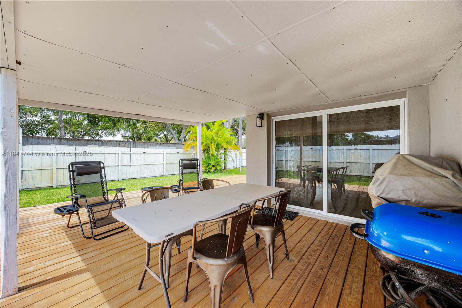 3246 Pierce Street Hollywood, FL 33021 - Photo 30 of 41 a view of a dining room with furniture window and wooden floor
