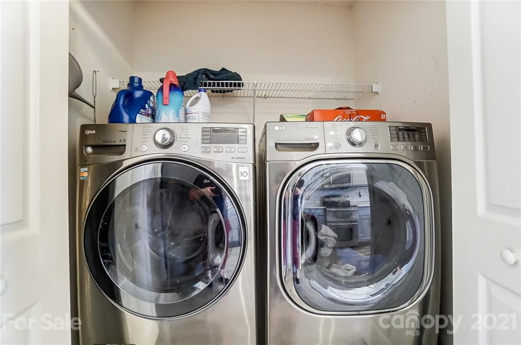 7034 Blithe Low Place Charlotte, NC 28273 - Photo 25 of 31 a utility room with dryer and washer