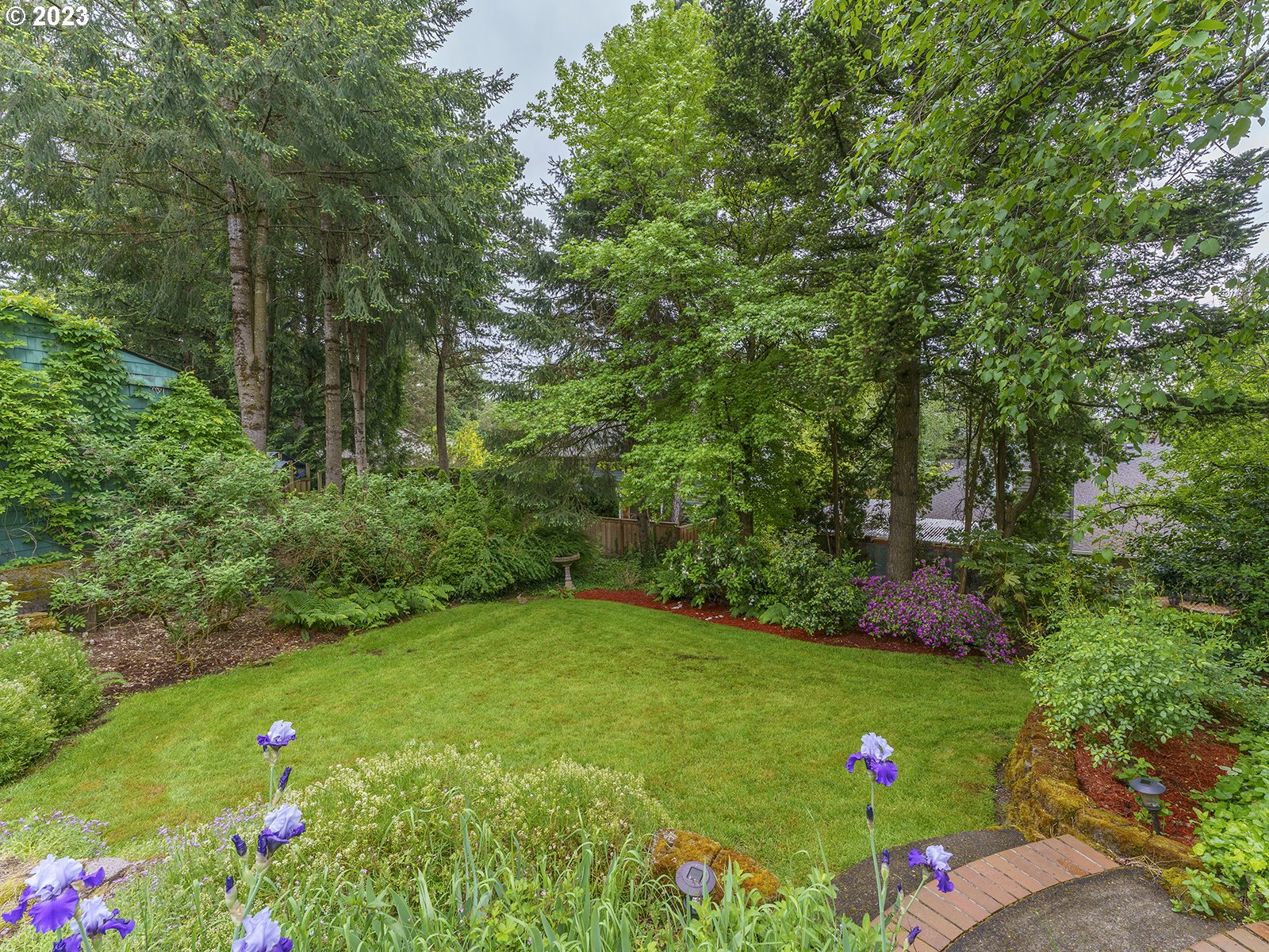 2828 Southwest Sunset Boulevard Portland, OR 97239 - Photo 25 of 32 a view of green field with plants and trees