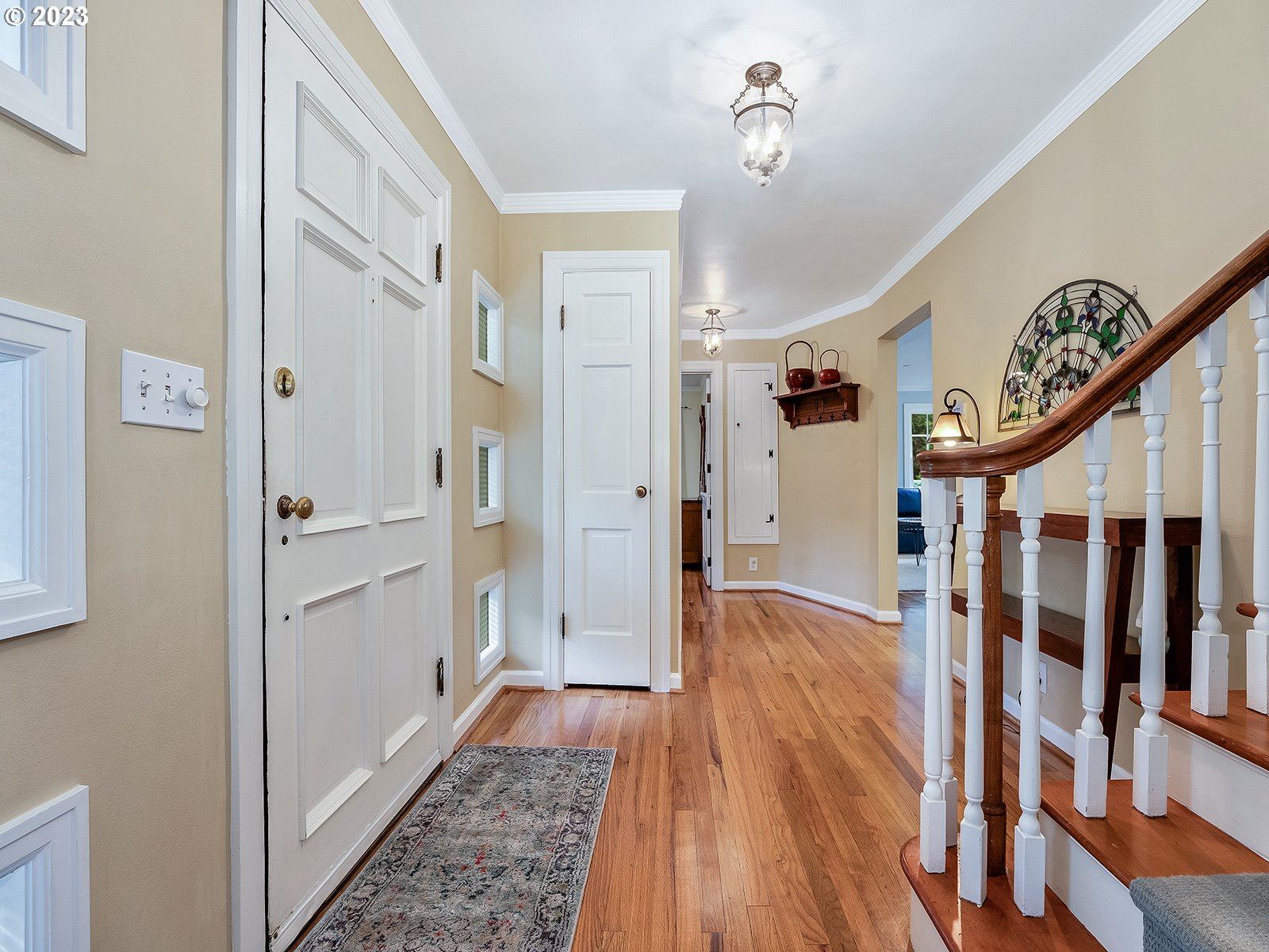 2828 Southwest Sunset Boulevard Portland, OR 97239 - Photo 4 of 32 a view of an entryway with wooden floor