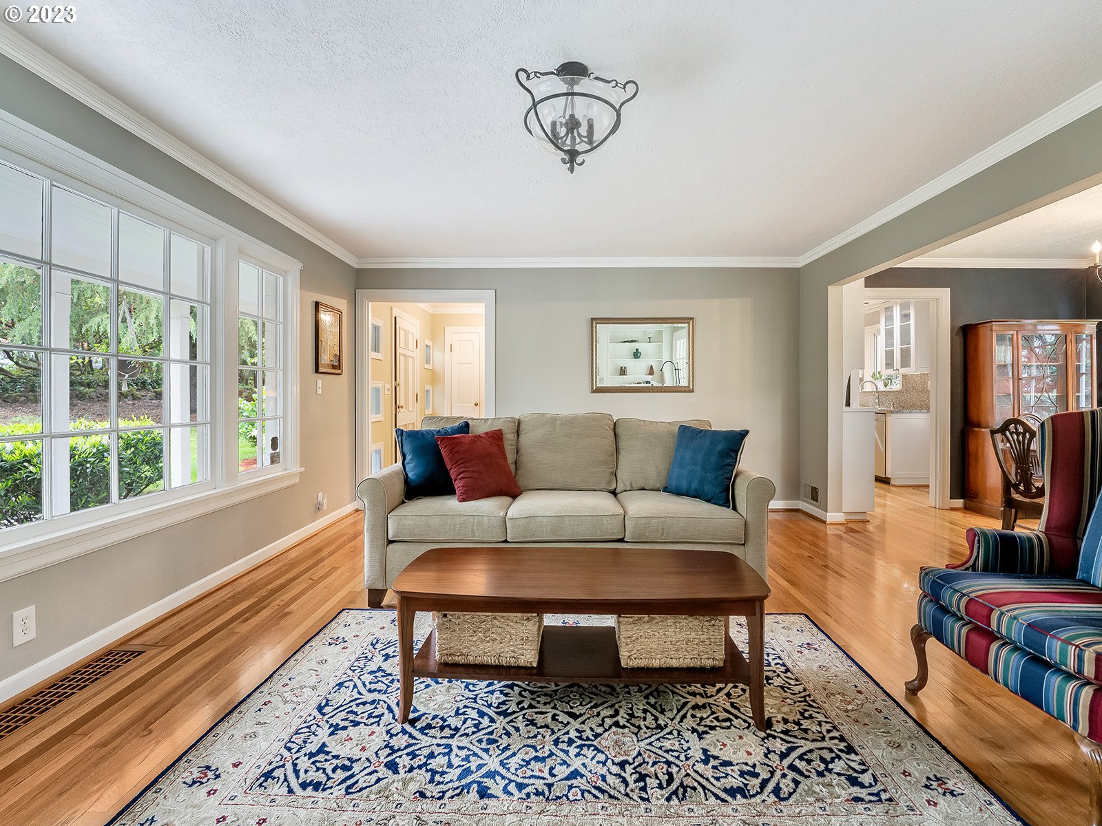 2828 Southwest Sunset Boulevard Portland, OR 97239 - Photo 6 of 32 a living room with furniture and a window