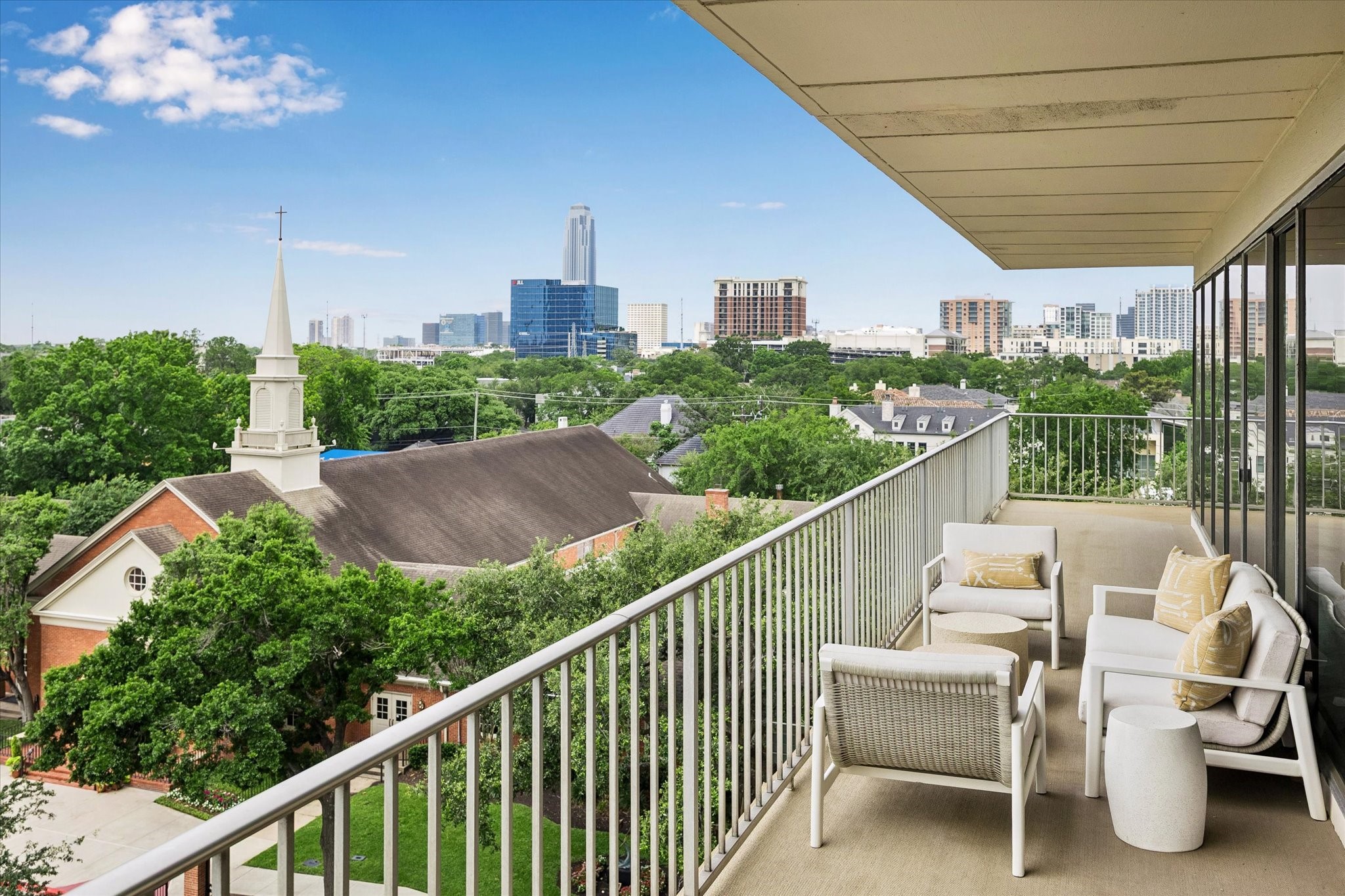 2200 Willowick Road, Unit 5C Houston, TX 77027 - Photo 18 of 27 Wrap around balcony provides views, great outdoor space, and natural light.