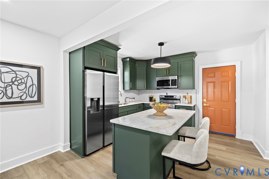 821 Fort Lee Road Petersburg, VA 23803 - Photo 10 of 45 White shaker cabinets with gold-tone hardware, sta