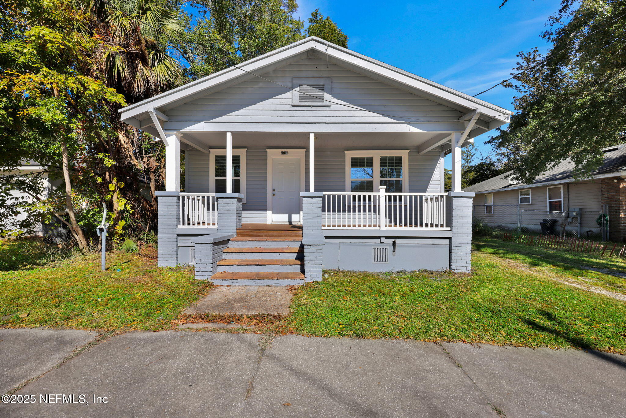 2915 Fitzgerald Street Jacksonville, FL 32254 - Photo 1 of 32 a front view of a house with a yard