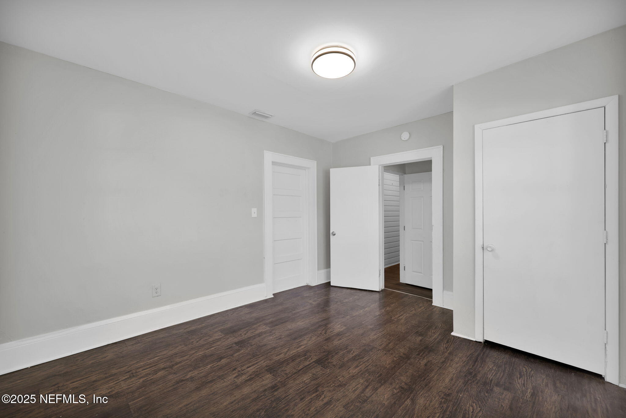 2915 Fitzgerald Street Jacksonville, FL 32254 - Photo 20 of 32 a view of an empty room with wooden floor