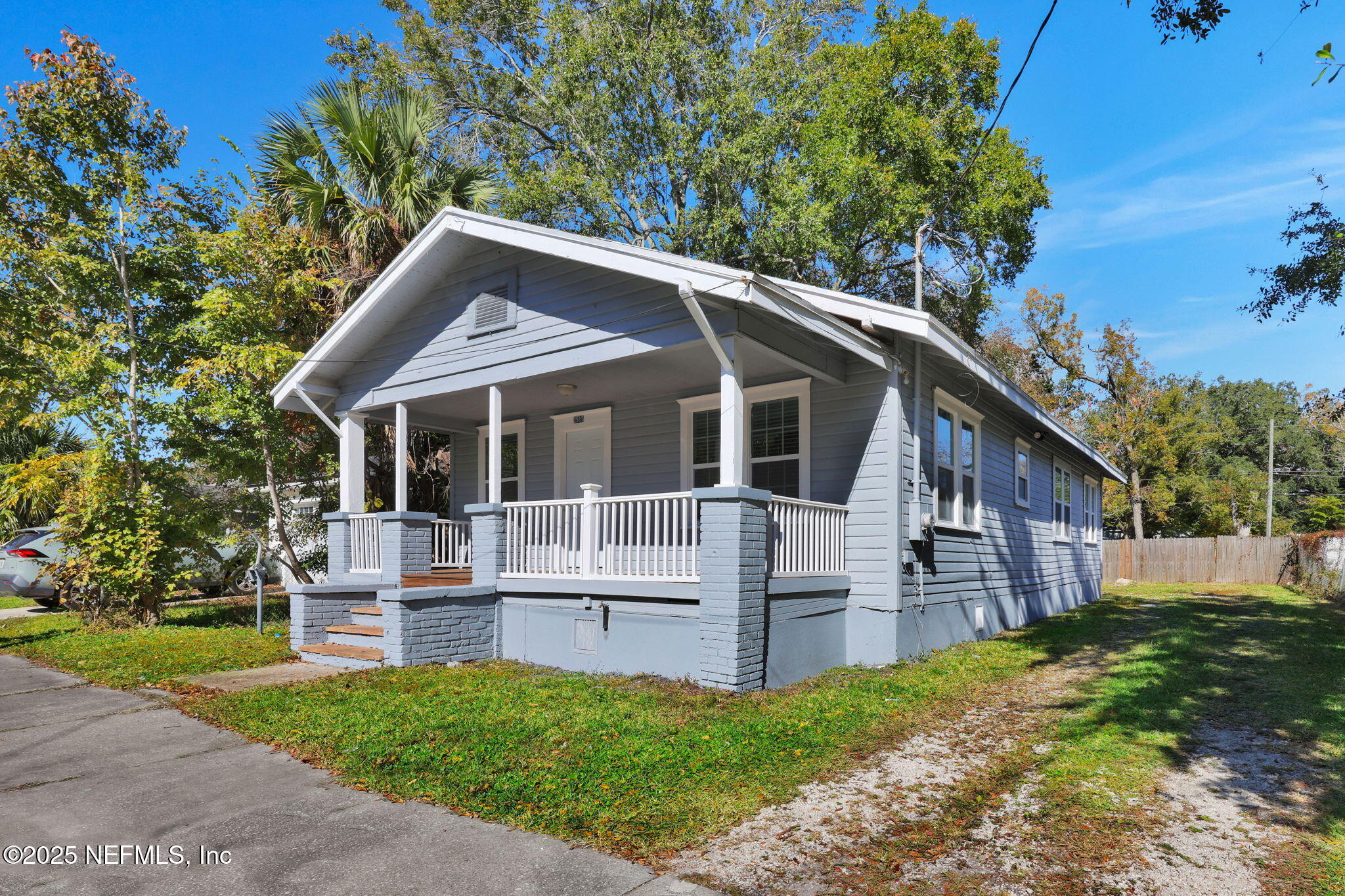 2915 Fitzgerald Street Jacksonville, FL 32254 - Photo 2 of 32 a front view of a house with a yard