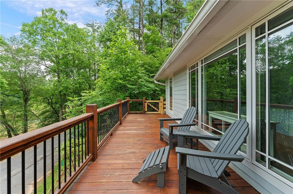 221 Reece Creek Road West Blairsville, GA 30512 - Photo 30 of 42 a view of a chairs and table in the balcony