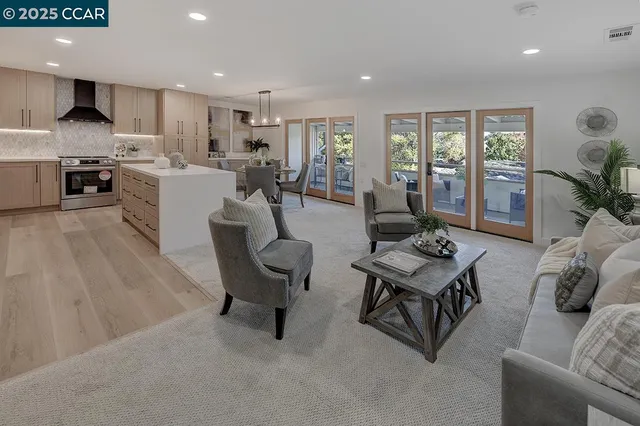 a living room with furniture and a table