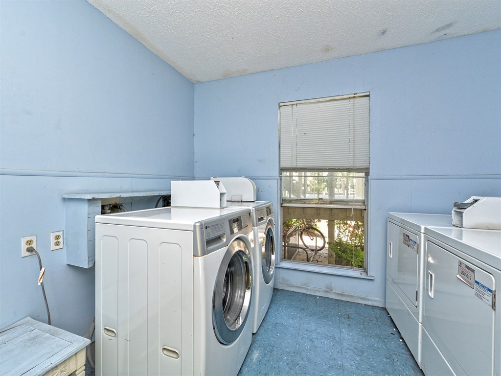 202 East 45th Street, Unit 203 Austin, TX 78751 - Photo 12 of 20 a utility room with dryer and washer