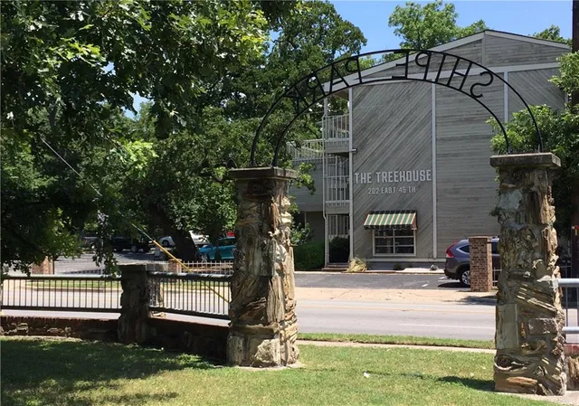 a park view with a seating space