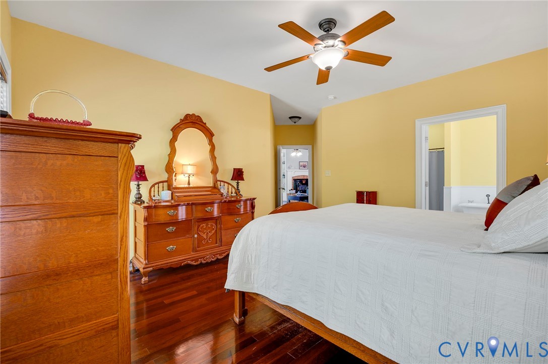 17170 Templeton Road Disputanta, VA 23842 - Photo 13 of 27 a bed room with a bed and a dresser