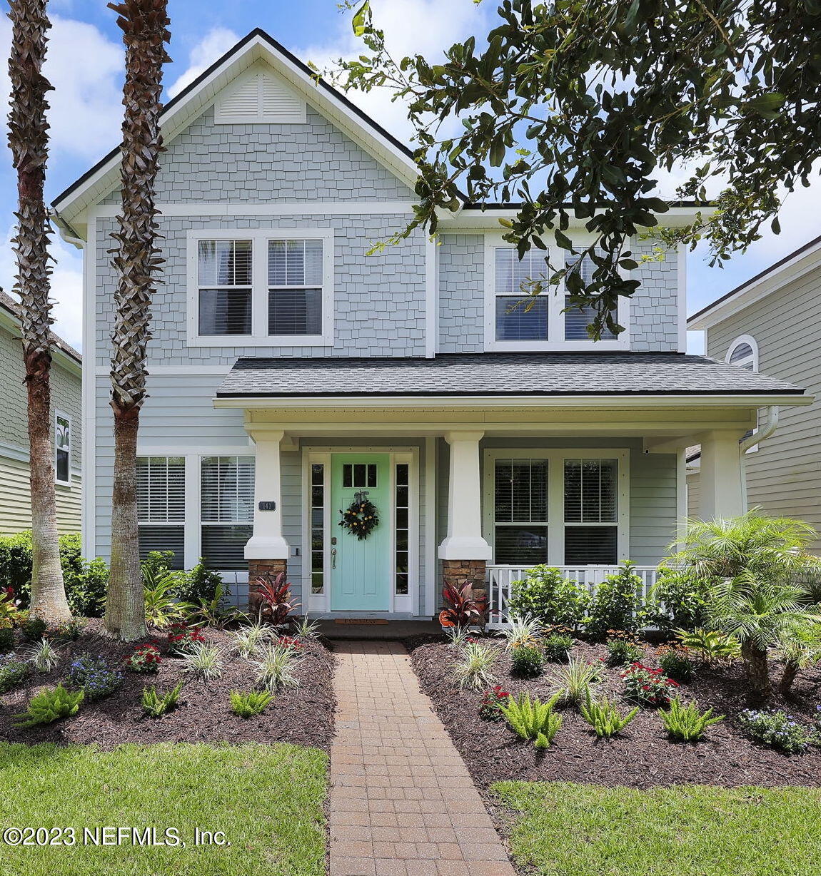 141 Pelican Pointe Road Ponte Vedra, FL 32081 - Photo 1 of 80 a front view of a house with a porch