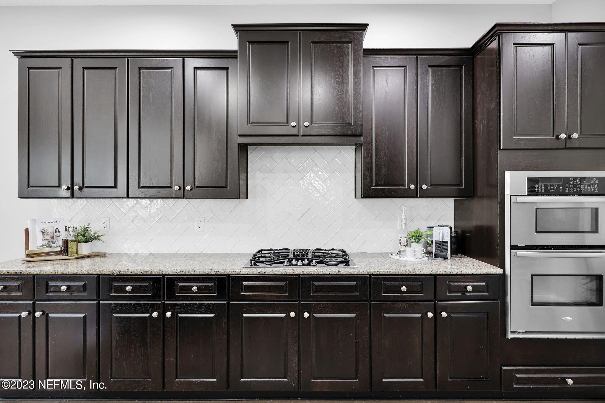 141 Pelican Pointe Road Ponte Vedra, FL 32081 - Photo 12 of 80 a kitchen with granite countertop a cabinets and steel appliances