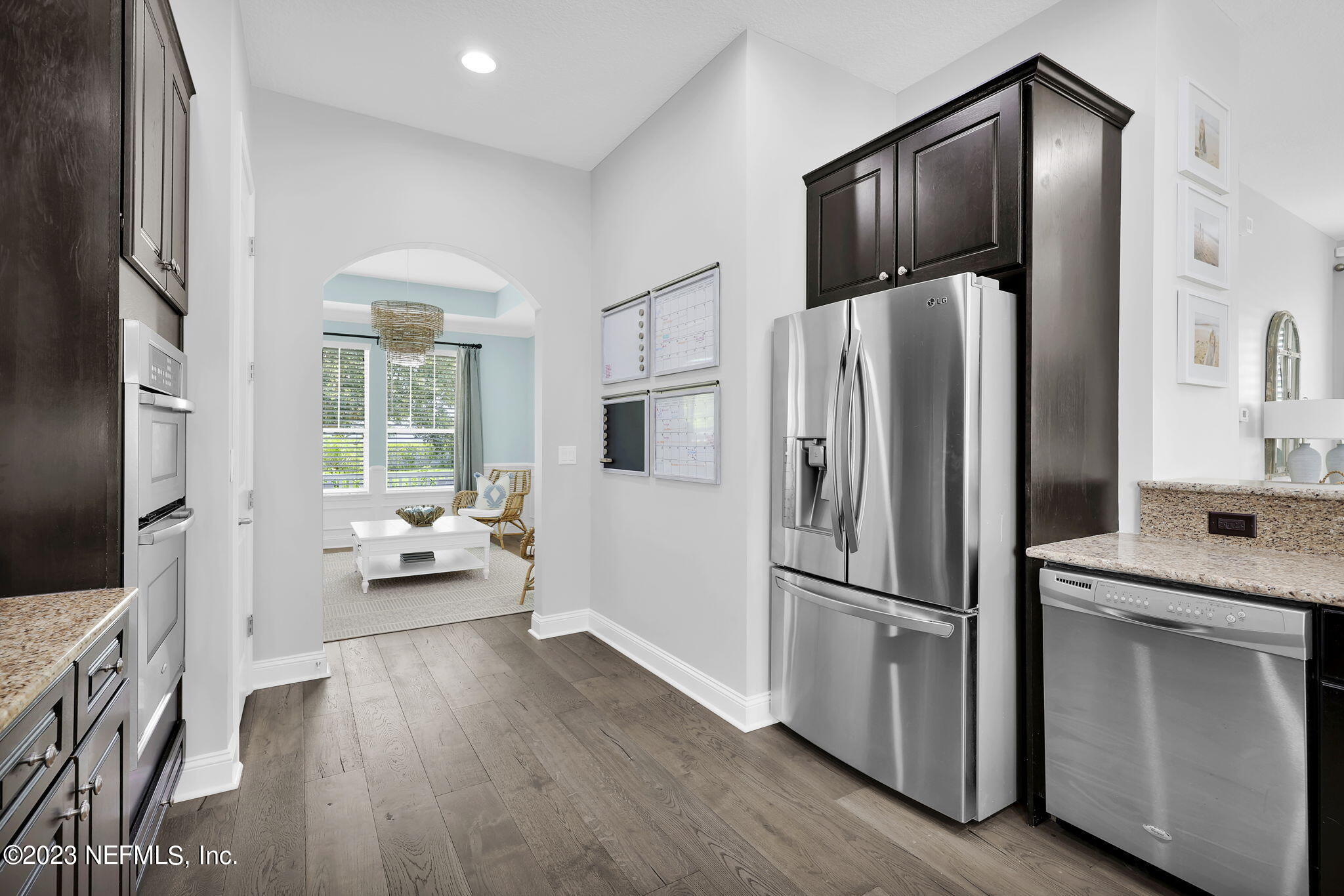 141 Pelican Pointe Road Ponte Vedra, FL 32081 - Photo 14 of 80 a kitchen with stainless steel appliances a refrigerator and a stove top oven
