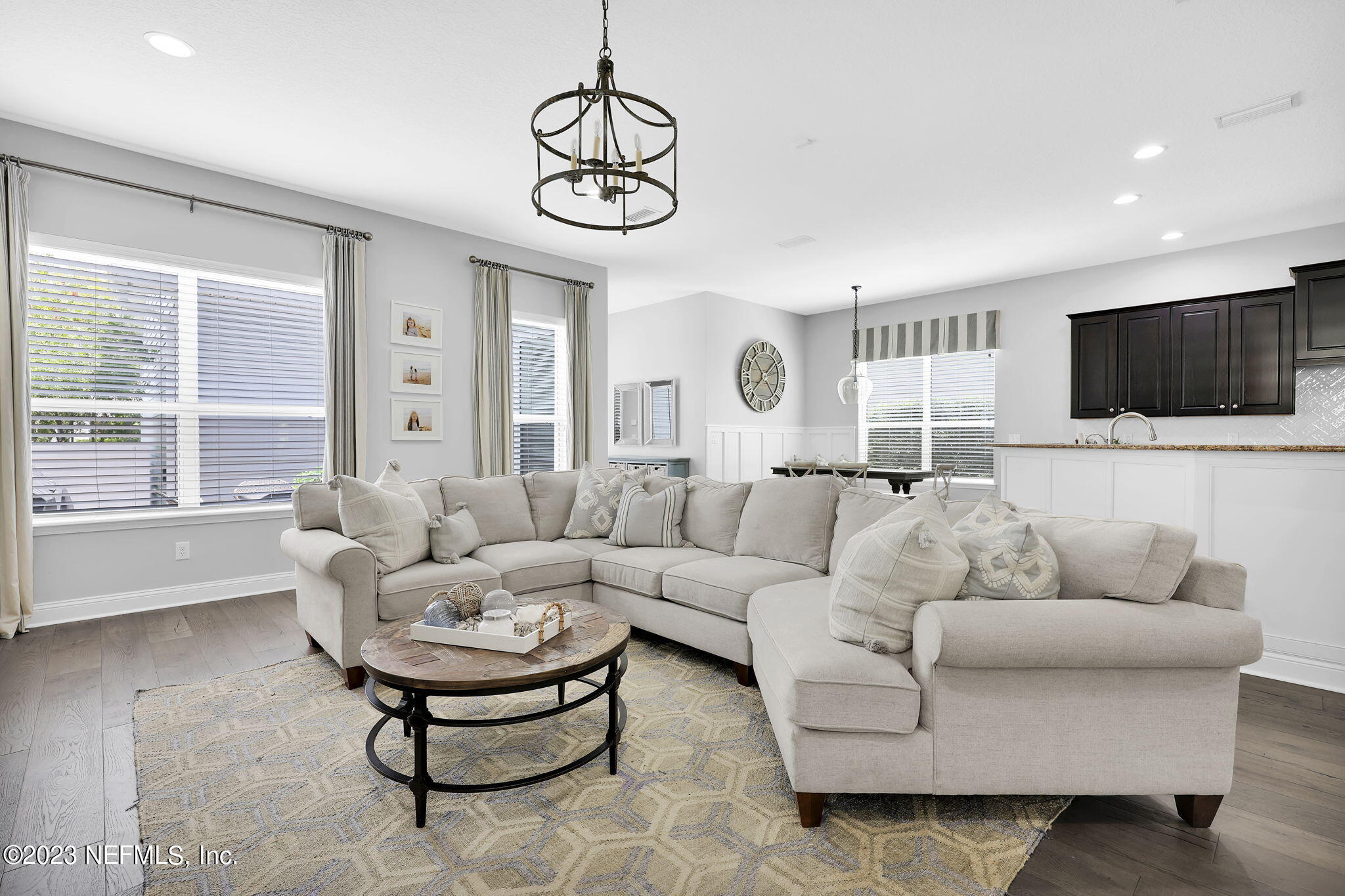 141 Pelican Pointe Road Ponte Vedra, FL 32081 - Photo 17 of 80 a living room with furniture a flat screen tv and a large window
