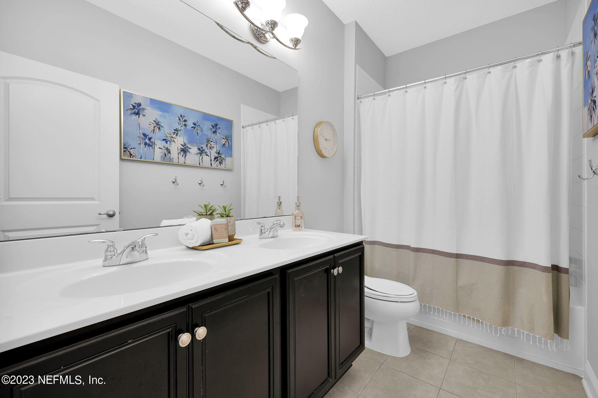 141 Pelican Pointe Road Ponte Vedra, FL 32081 - Photo 31 of 80 a bathroom with a double vanity sink toilet and a mirror