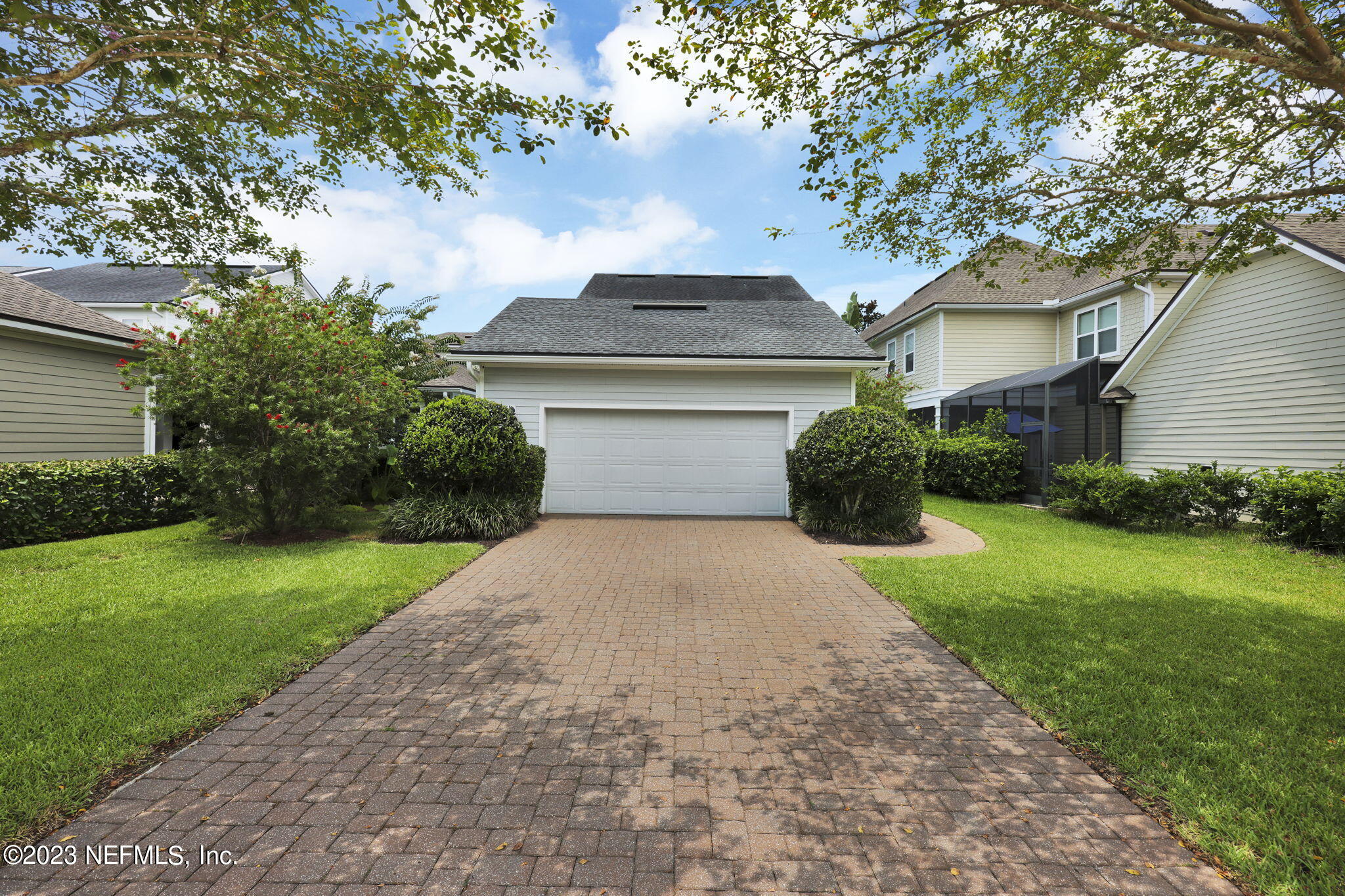 141 Pelican Pointe Road Ponte Vedra, FL 32081 - Photo 36 of 80 a front view of a house with a yard and garage