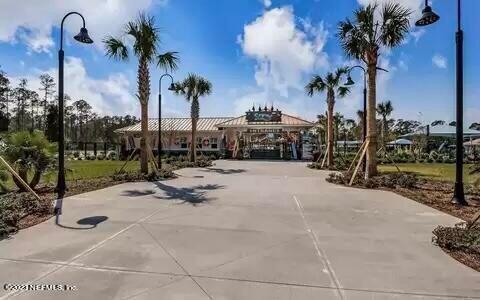 141 Pelican Pointe Road Ponte Vedra, FL 32081 - Photo 67 of 80 a view of a backyard of the house