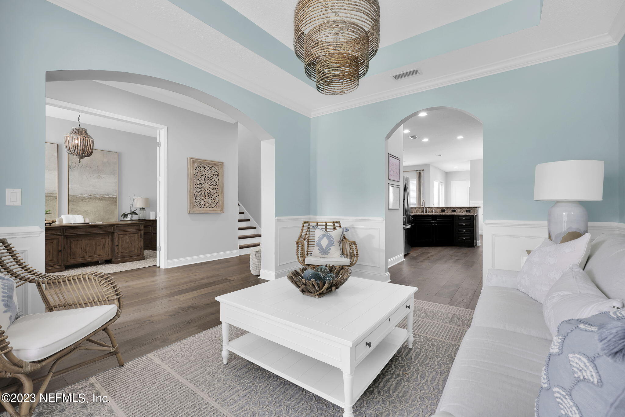 141 Pelican Pointe Road Ponte Vedra, FL 32081 - Photo 8 of 80 a living room with furniture and a chandelier