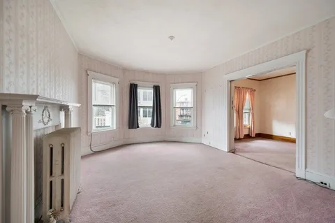 a view of a livingroom with a fireplace