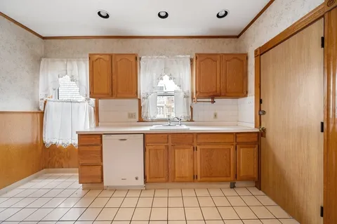 a bathroom with a sink a mirror and a bathtub