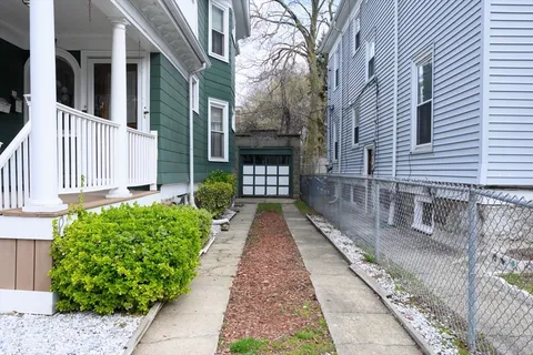 a view of a pathway with a house