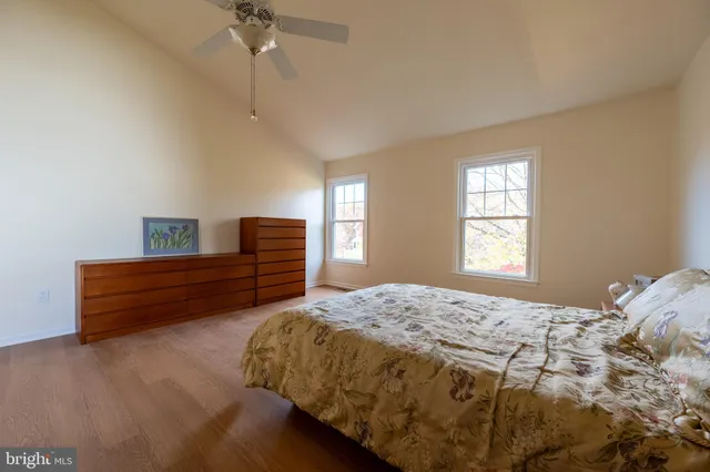 a living room with stainless steel appliances granite countertop furniture and a window