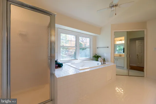 a view of workspace with furniture and a window
