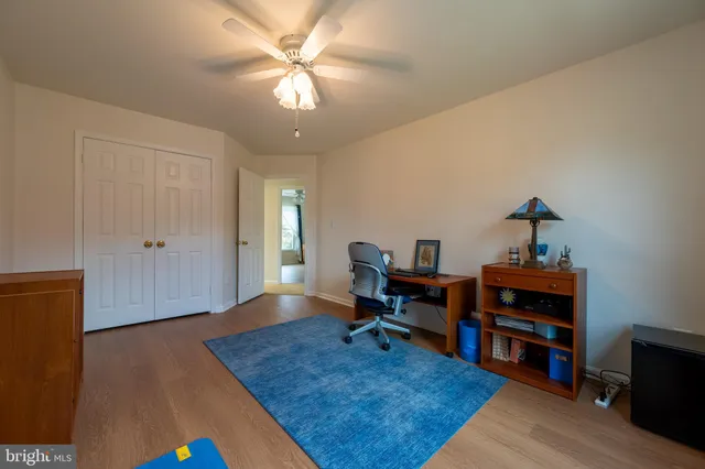 a room with furniture and a table and chairs
