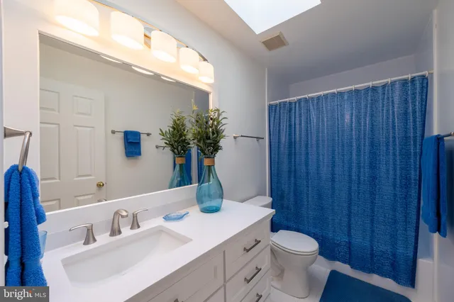 a view of work space with cabinets