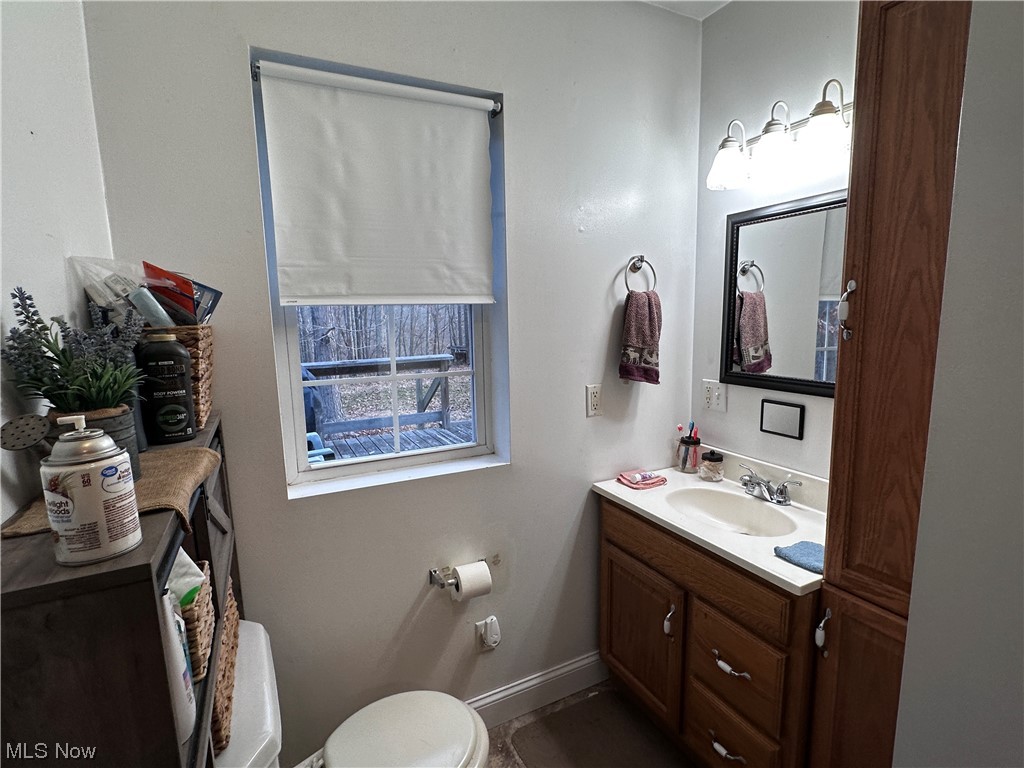 50748 Shenandoah Road Caldwell, OH 43724 - Photo 12 of 43 Bathroom with toilet and vanity