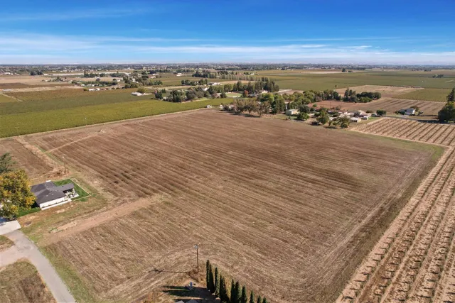 an aerial view of a house with a outdoor space