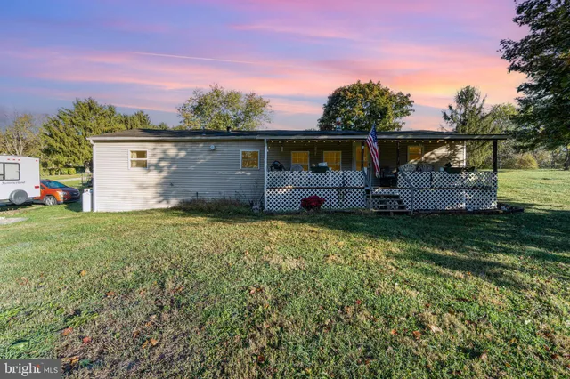 front view of a house with a big yard