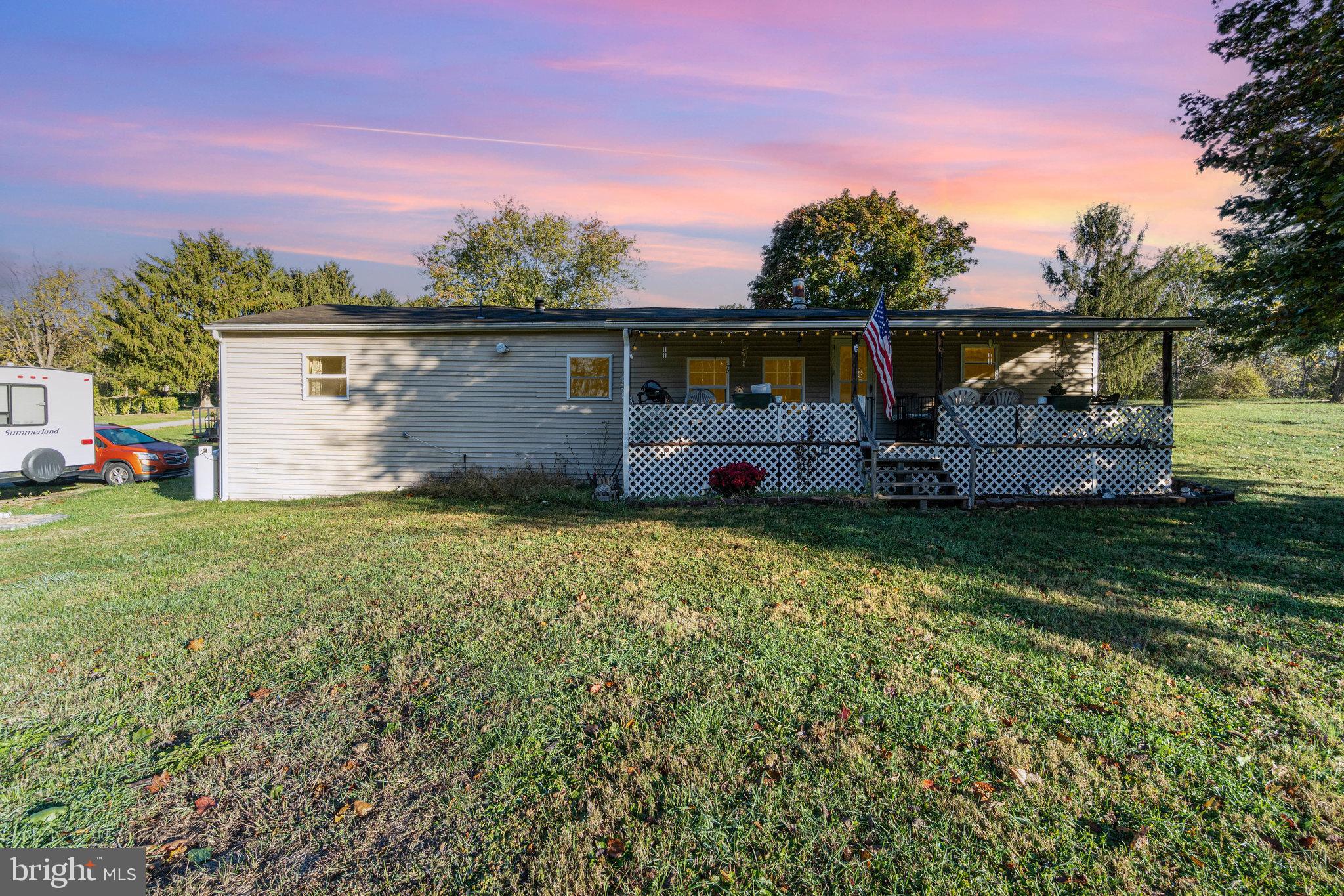 front view of a house with a big yard