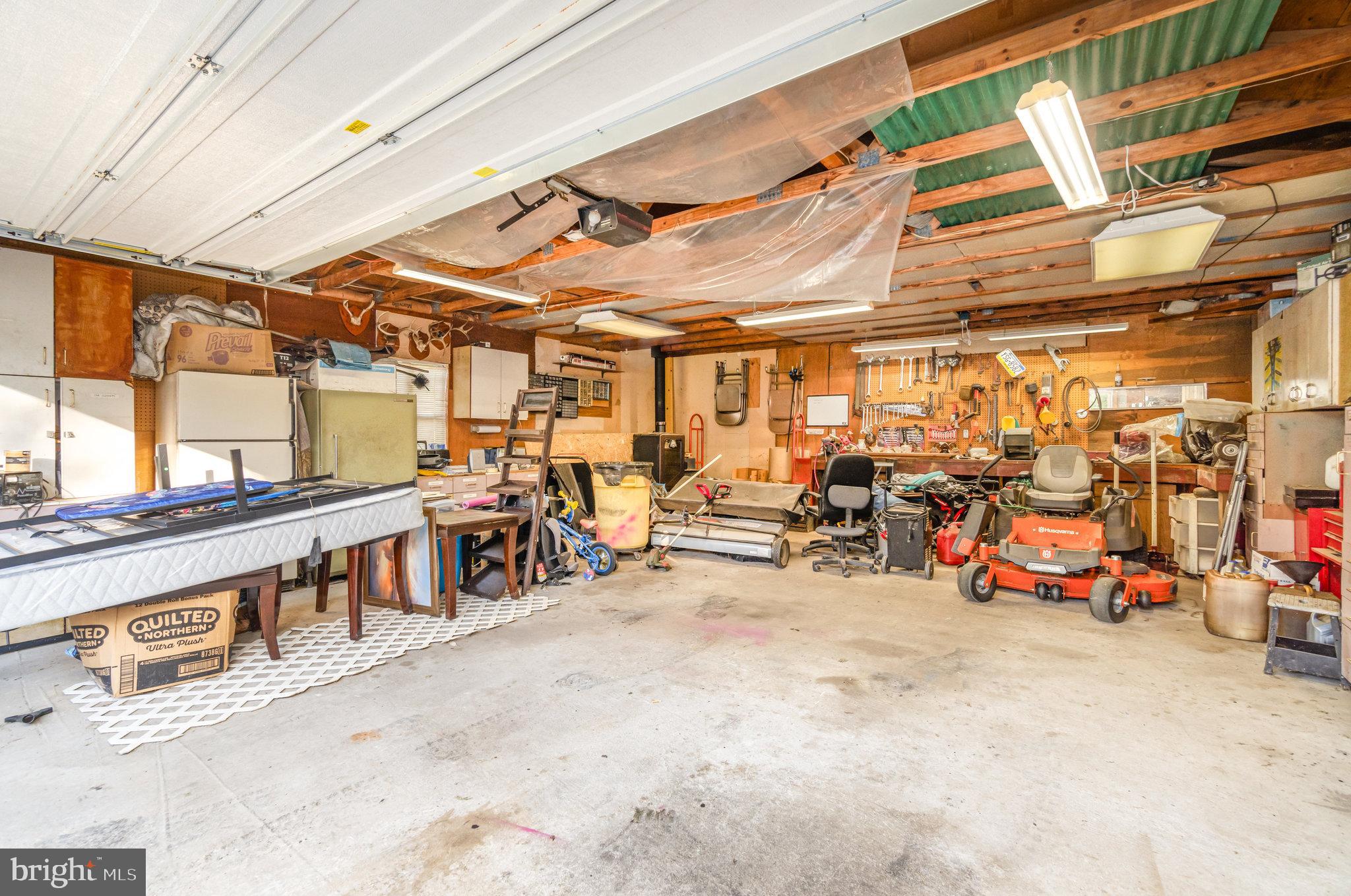 137 Oak Flat Road Newville, PA 17241 - Photo 20 of 36 a view of a storage room with a lot of stuff
