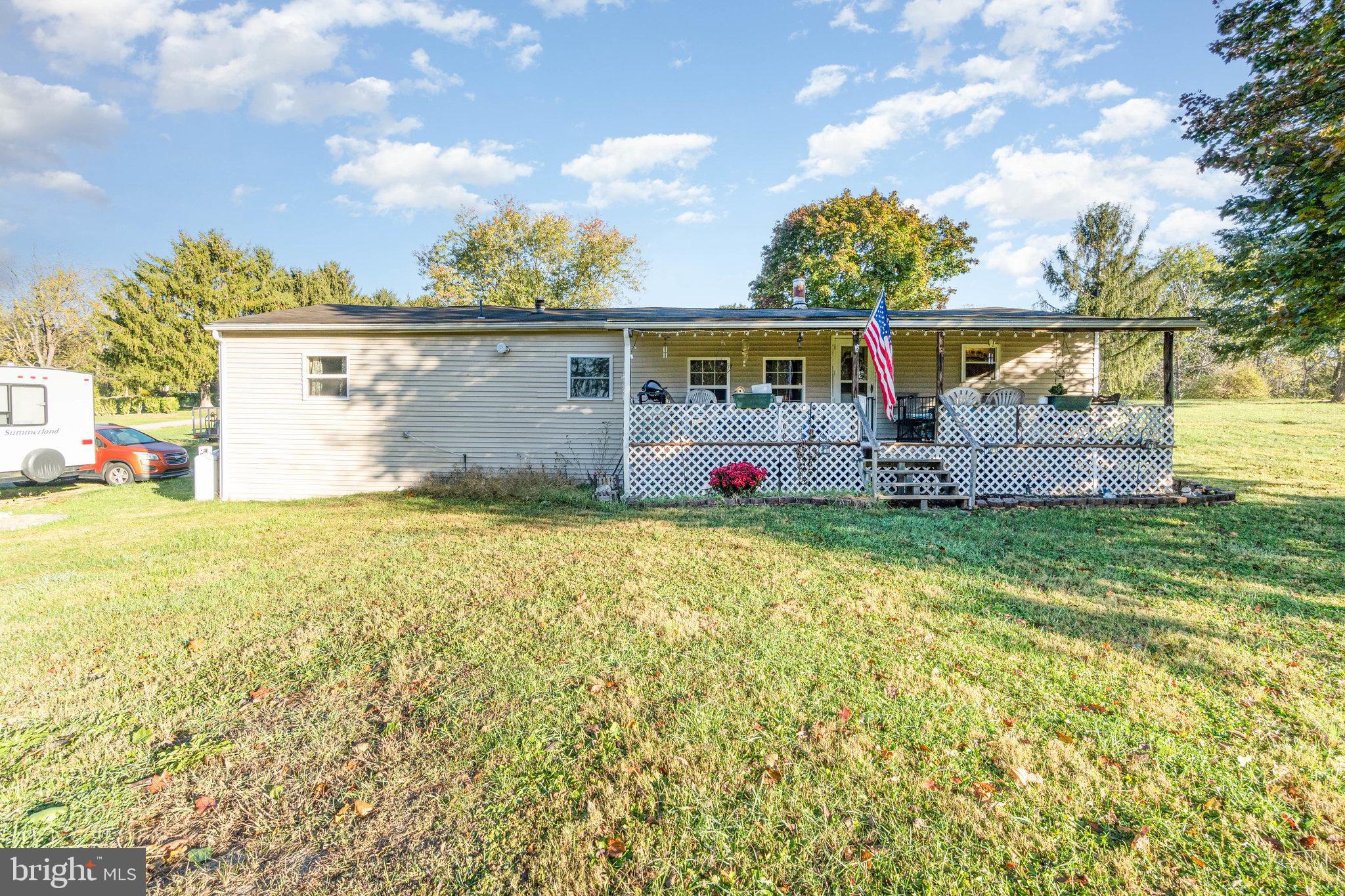 137 Oak Flat Road Newville, PA 17241 - Photo 22 of 36 a front view of a house with garden