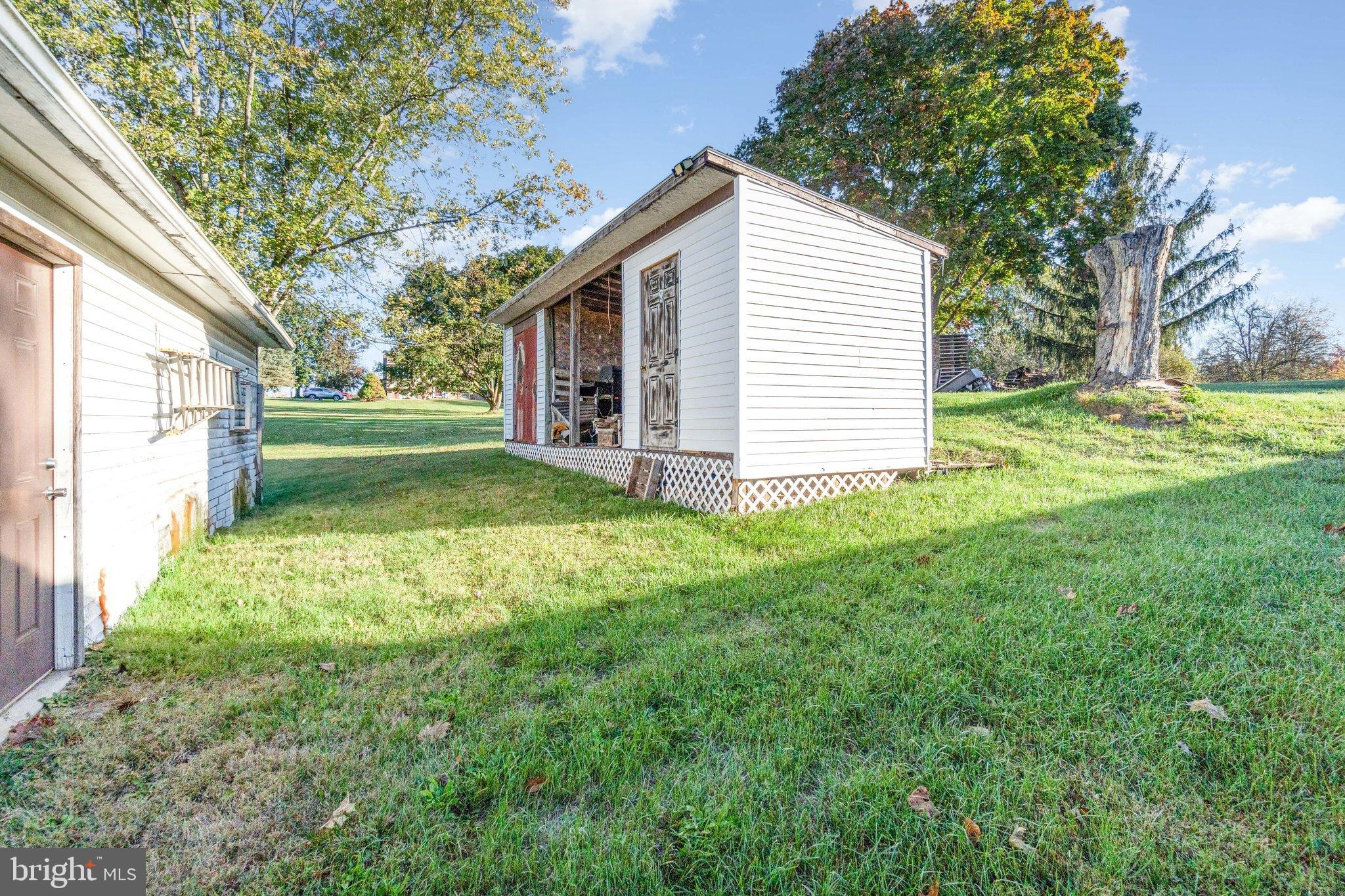 137 Oak Flat Road Newville, PA 17241 - Photo 27 of 36 a view of a house with a yard and pathway
