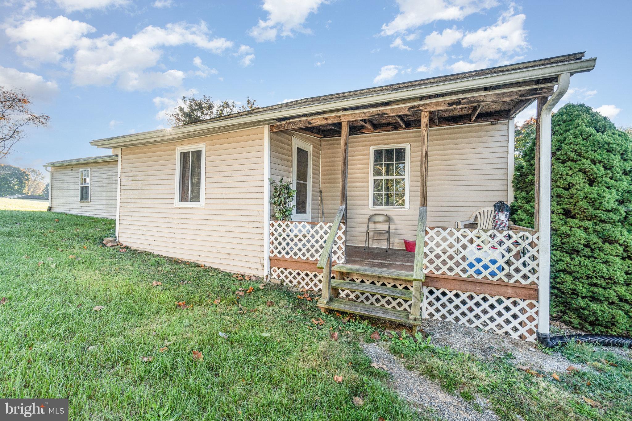 137 Oak Flat Road Newville, PA 17241 - Photo 28 of 36 a front view of a house with a garden