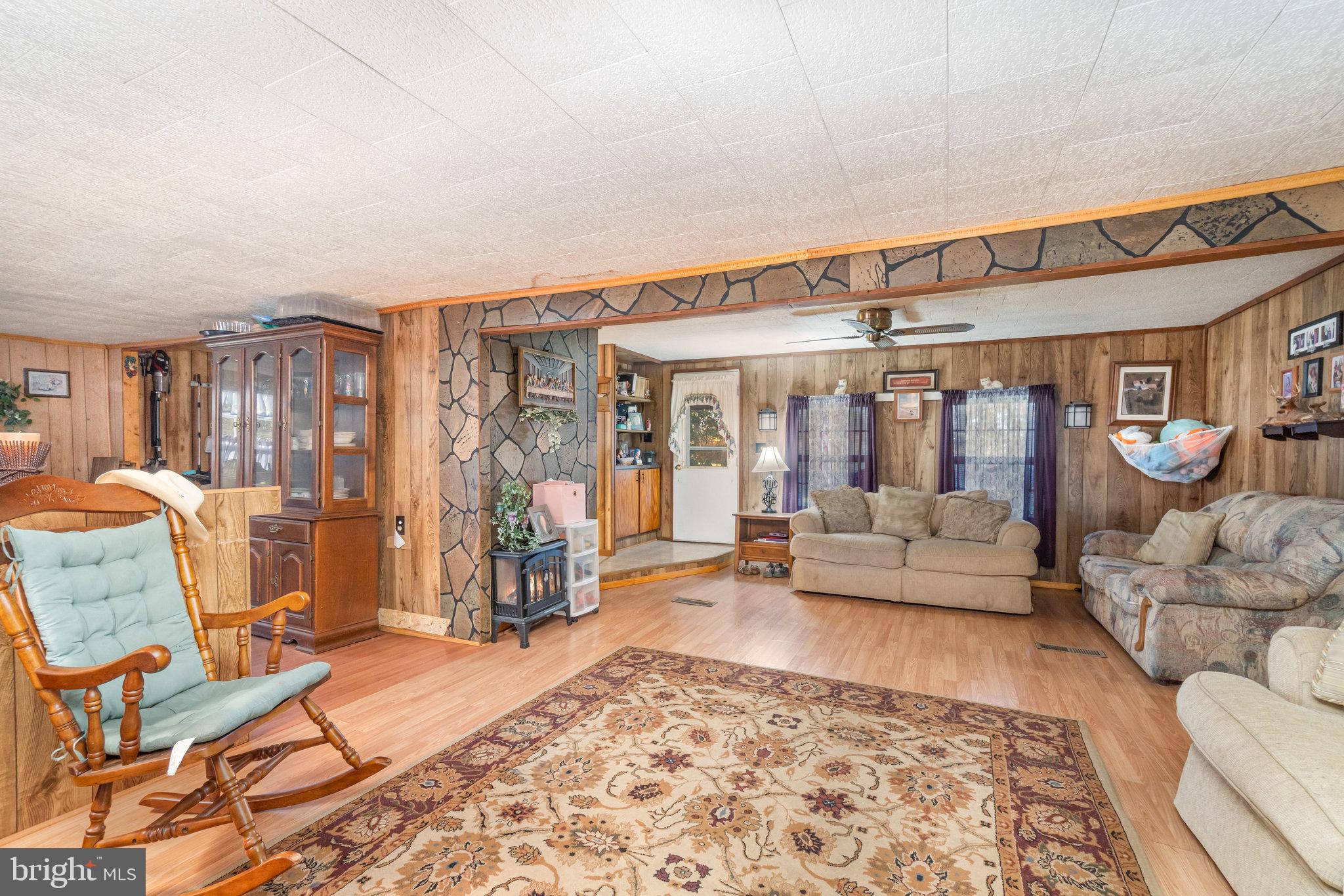 137 Oak Flat Road Newville, PA 17241 - Photo 3 of 36 a living room with furniture and a rug