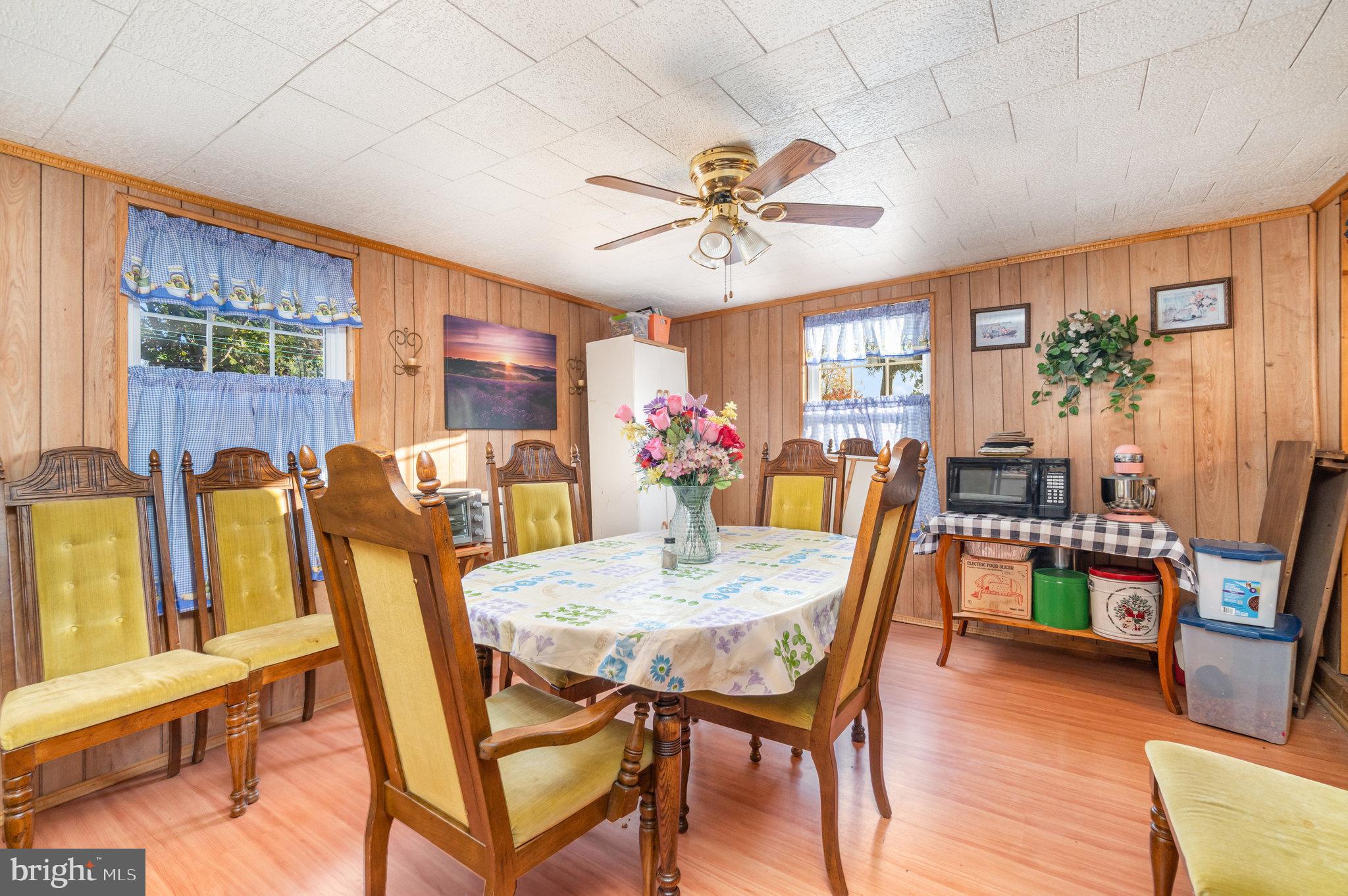 137 Oak Flat Road Newville, PA 17241 - Photo 6 of 36 a view of a dining room with furniture window and wooden floor