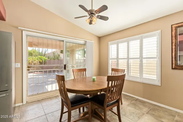 a view of a dining room with furniture